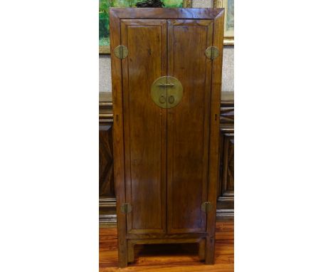 Tall vintage Chinese two (2) door cabinet with brass hardware. Unsigned. Scuffs and rubbing or in good condition. Measures 67