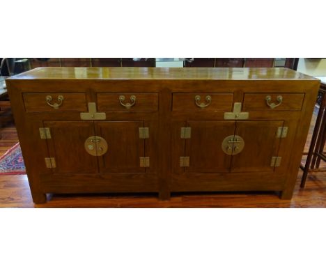 Vintage Chinese extra long multi drawer and door hardwood and brass buffet cabinet. Unsigned. Scratches, rubbing from use or 