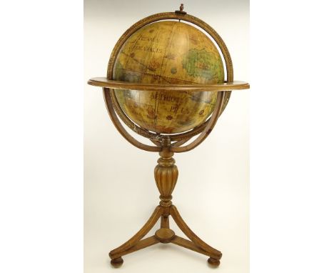 Mid 20th century painted metal and carved wood terrestrial globe on stand. Unsigned. Rubbing, wear, breaks to wood. Please ex