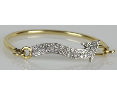 Retro 14 Karat Yellow Gold and Diamond "Arrow" Bracelet. Clip on bangle. Signed 14K. Good Condition. Measures 2-1/4 by 1-3/4 