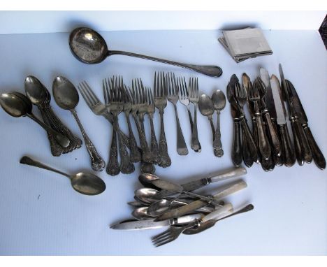 An assortment of silver plated flatware to include a large soup ladle 