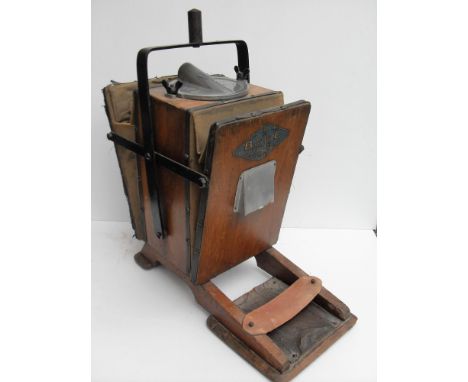 An early 20th century manual BVC vacuum cleaner 