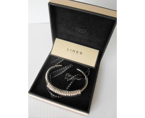 A Links of London boxed hallmarked silver open bangle and a London silver faceted bangle bracelet (2) 