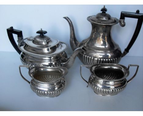 A large selection of silver plated table ware to include a tea service, water jug, dishes, etc 