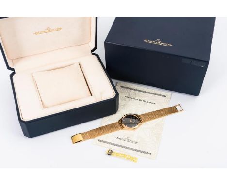  Goldene Herrenarmbanduhr Jaeger-LeCoultre.  Gehäusenummer: 143.  Referenznr.: 145.2.79.S.  Gemarktes Federwerk mit Schweizer