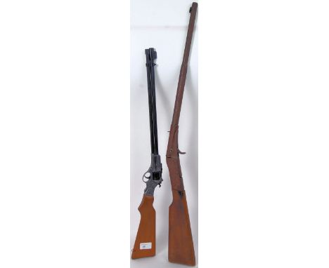 Two vintage cap guns / air guns the first being a vintage Haenel cork firing gun, the other a cap gun


POSTAGE: UK Postage o