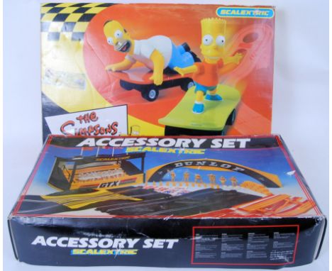 Two Scalextric sets - the first being The Simpsons Skateboard Chase, and Scalextric Accessory Set. Both appear complete (But 