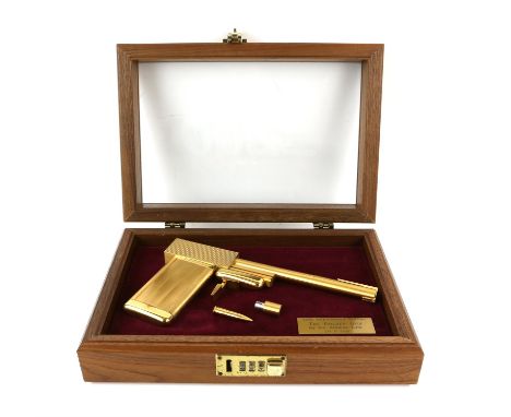 James Bond The Man With The Golden Gun - A replica golden gun, 24 karat gold-plated replica manufactured by S.D. Studios Ltd.