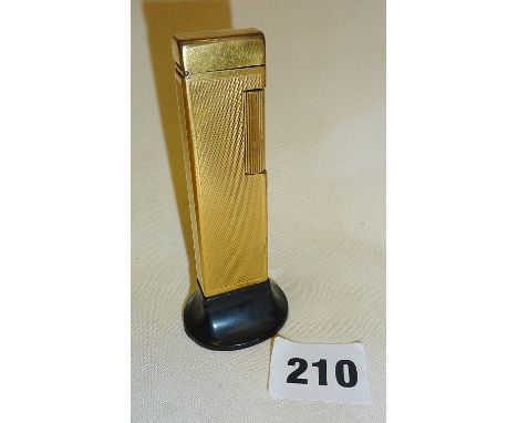 Unusual vintage gold-coloured Dunhill table lighter with bakelite stand