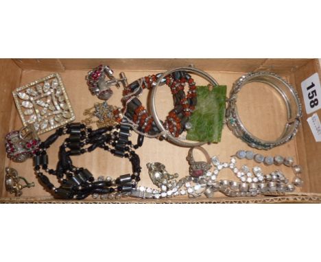 Tray of vintage costume jewellery including a Chinese jade pendant carved with a dragon