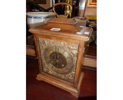 Victorian bracket type mantle clock in walnut case, the movement having 18th c. brass dial with silvered chapter ring