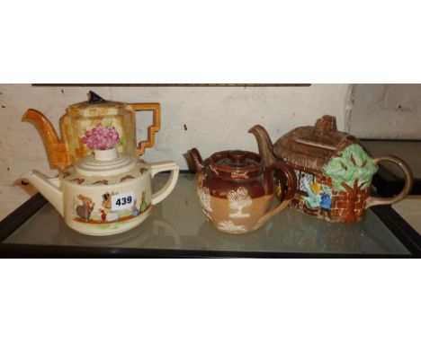 Four china teapots, Art Deco Bunnykins, and a Sundial teapot, Royal Doulton Stoneware teapot, and a Radford Cottage ware teap