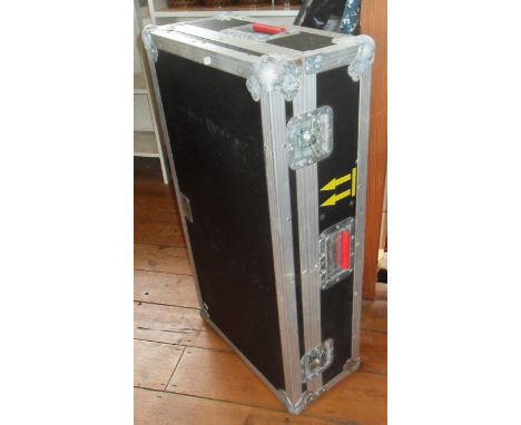 A Trifibre aluminium cabin trunk on wheels