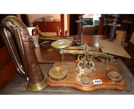 Antique brass letter scales on wooden base with brass weights and a copper and brass bugle by Hawkes & Son, London, inscribed