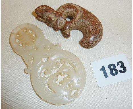 A Chinese Hetian Jade 'two dragon' pendant and a Tibetan hardstone rabbit amulet