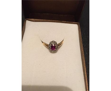 18ct gold/platinum diamond and ruby ring