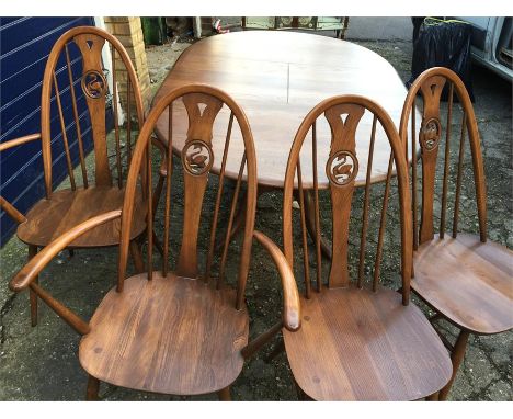 Ercol extendable table, plus 2 swan back chairs and 2 swan back carvers