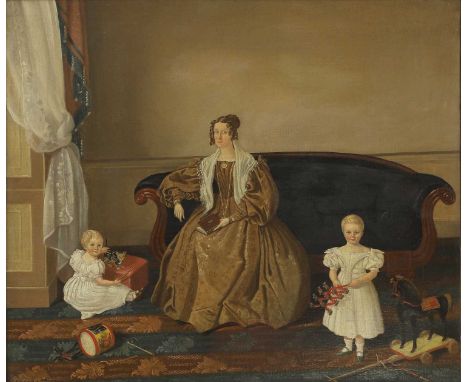 English Naive School, c.1830  A family group in an interior, a lady on a sofa holding a book and her two young children with 