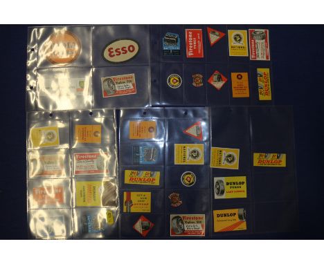 A quantity of miniature advertisement labels for "Firestone Tyres", "Dunlop", "Esso", "Dominion", "Lucas", etc