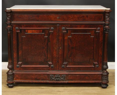 A 19th century amboyna and rosewood dining room press or side cabinet, hipped rectangular marble top above a frieze drawer an