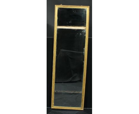 A 19th century giltwood full-length split-plate leaner mirror, gadrooned border, bevelled plates, 175cm high, 56cm wide 