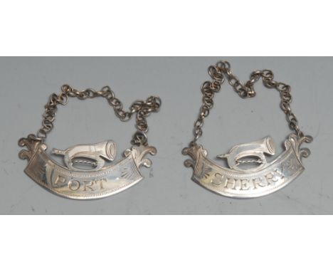 A pair of Elizabeth II silver wine labels, Port and Sherry, each crested by a bugle, 6cm wide, Sheffield 2008 