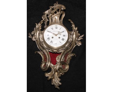 A 19th century French silvered cartouche shaped cartel clock, 13cm convex enamel dial inscribed Planchon, Paris, twin-winding