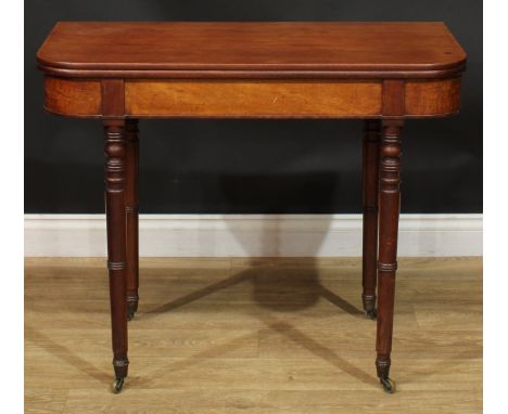 A 19th century mahogany tea table, hinged top, ring-turned legs, brass casters, 74.5cm high, 91.5cm wide, 45.5cm deep 