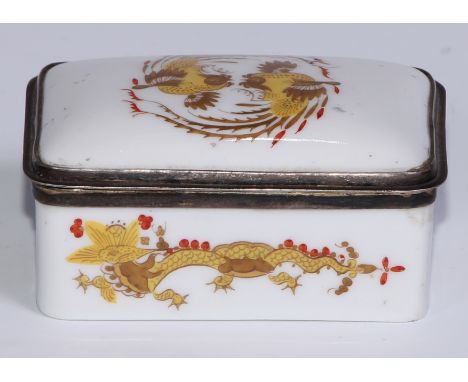 A German silver coloured metal mounted porcelain rounded rectangular snuff box, painted in the Chinese manner with phoenixes 