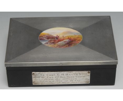 An early 20th century  cigarette box, the cover inset with a Royal Worcester plaque, painted by Ray Rushton, signed, silver c