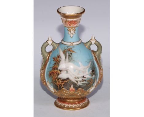 A Royal Worcester ovoid vase, painted by Charles Baldwin, signed, with swans, on a turquoise ground, 15.5cm high, shape no.15