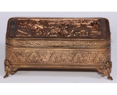 A French gilt metal rounded rectangular table casket, hinged cover with electrotype panel in the manner of Teniers with revel
