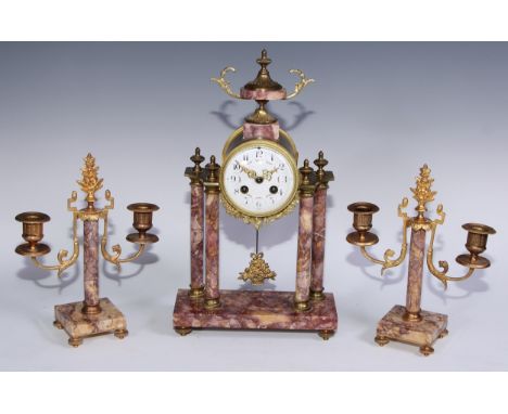 A French gilt metal mounted breche violette portico clock garniture, 9cm circular dial inscribed with Arabic numerals, the ar