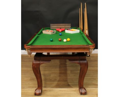 An early to mid 20th century oak combination snooker dining table, by E.J. Riley Limited, Accrington, rectangular top with fo