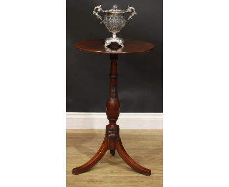 A 19th century mahogany tripod wine table, circular top inlaid with a six-pointed star, ring-turned column, sabre legs, 74.5c