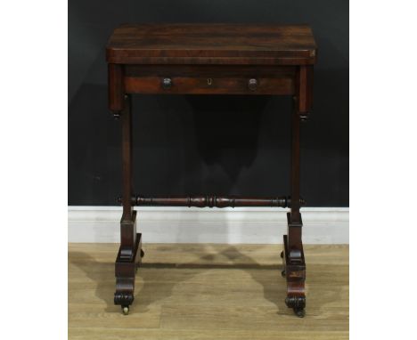 A William IV rosewood combination work and card table, hinged top enclosing an inset velvet playing surface above a frieze dr