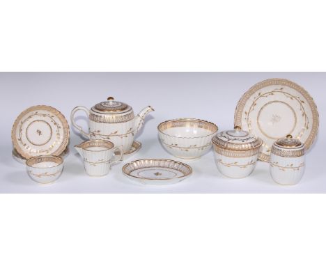 A Worcester part tea service, comprising teapot, sucrier, caddy, milk jug, slop bowl, spoon trays, dishes and teabowl and sau