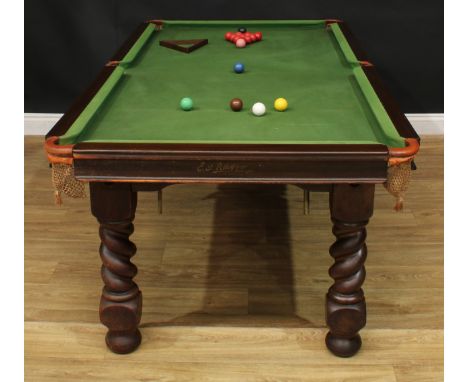 An early to mid 20th century oak combination snooker dining table, by E.J. Riley Limited, Accrington, rectangular top with fo