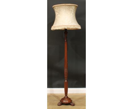 A George III Revival mahogany floor lamp, fluted column carved with acanthus and ears of wheat, ball and claw, 156cm high und