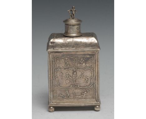 A Dutch silver rectangular tea caddy, profusely chased with busy scenes of putti and courting couples, push-fitting cap, slid