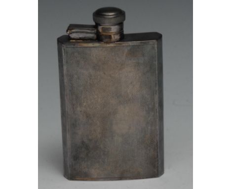 An Art Deco style silver curved canted rectangular hip flask, engine turned overall, 12cm long, James Dixon &amp; Sons, Sheff