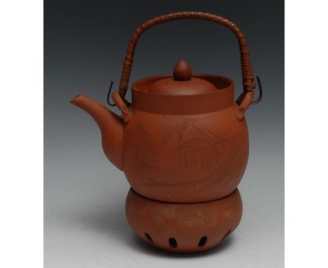 A Japanese Yixing type terracotta kettle and stand, 30cm high overall 