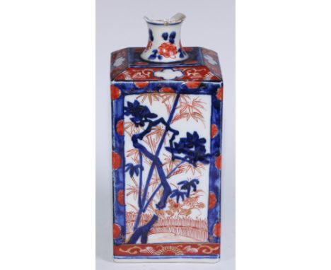 A 17th century Japanese square vase, painted in the Imari palette with ikebana, flowers and prunus, 21cm high, c.1700 