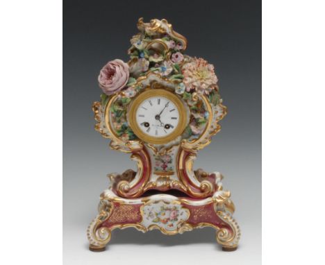 A French Rococo Revival porcelain cartouche shaped mantel clock, 6cm circular enamel dial inscribed Hy. Marc a Paris, Roman n