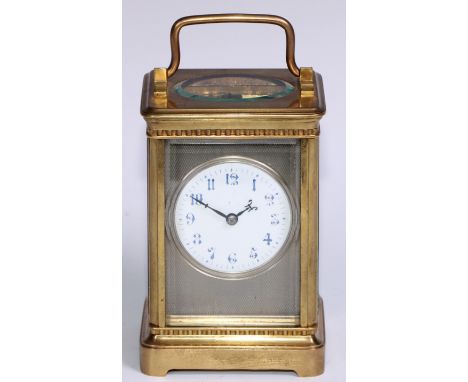 A large French lacquered brass carriage timepiece,  6cm circular enamel clock dial inscribed with Arabic numerals, on a silve