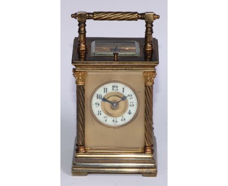 A 19th century lacquered brass repeater carriage clock, 4.5cm enamel chapter ring inscribed with Arabic numerals, repeating m