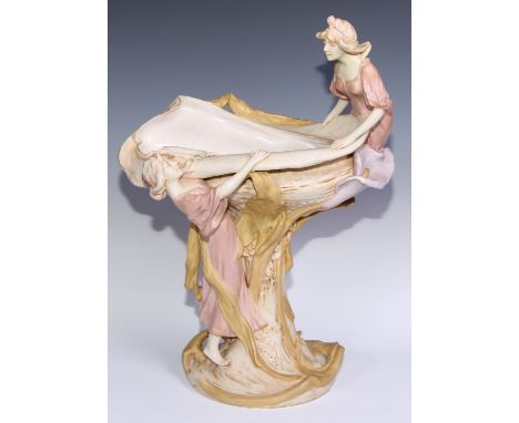 A Royal Dux Art Nouveau table centrepiece, modelled with two young ladies amongst water lilies, 53.5cm high, model no.875, ra