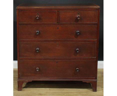 A George III oak chest, rectangular top above two short and three long graduated cockbeaded drawers, bracket feet, 102.5cm hi
