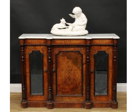 A late Victorian walnut and marquetry side cabinet or credenza, marble top above a pair of mirrored doors centred by a panel 