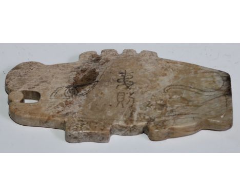 A Chinese Jade archaic type pendant, primitively carved as a mythical beast, 12.4cm wide, 6.5cm high 